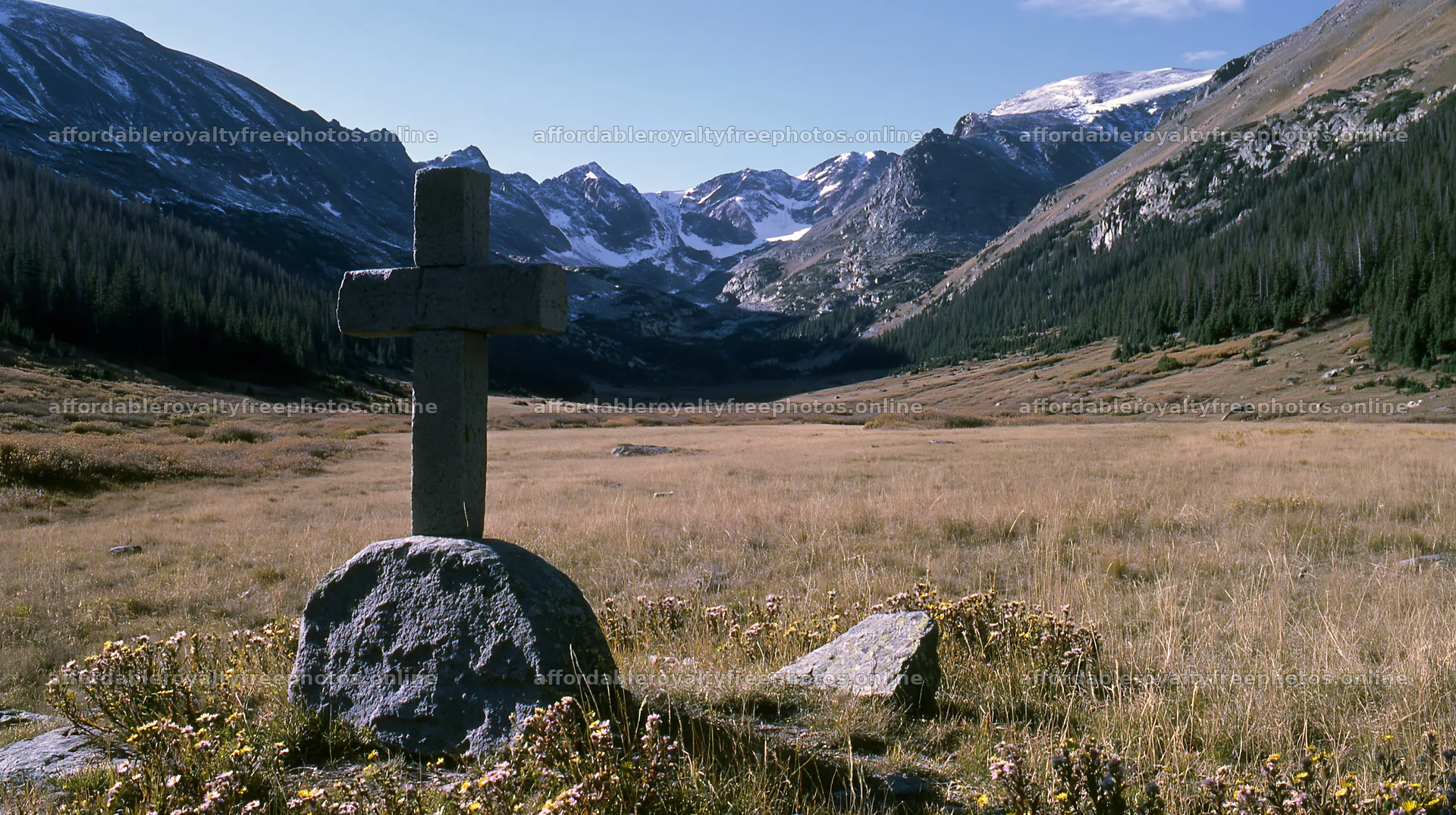 Stone Christian cross in alpine valley meadow – royalty-free photos 10608x5938