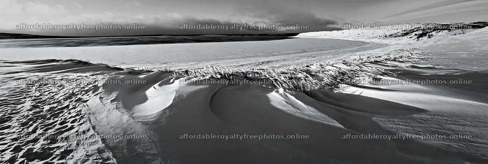 Snowy lakeside meadow with ice and snow formations – royalty-free photos 13690x4602
