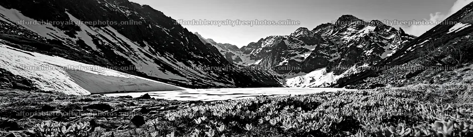 Frozen tarn in mountain meadow during winter season – royalty-free photos 14762x4268