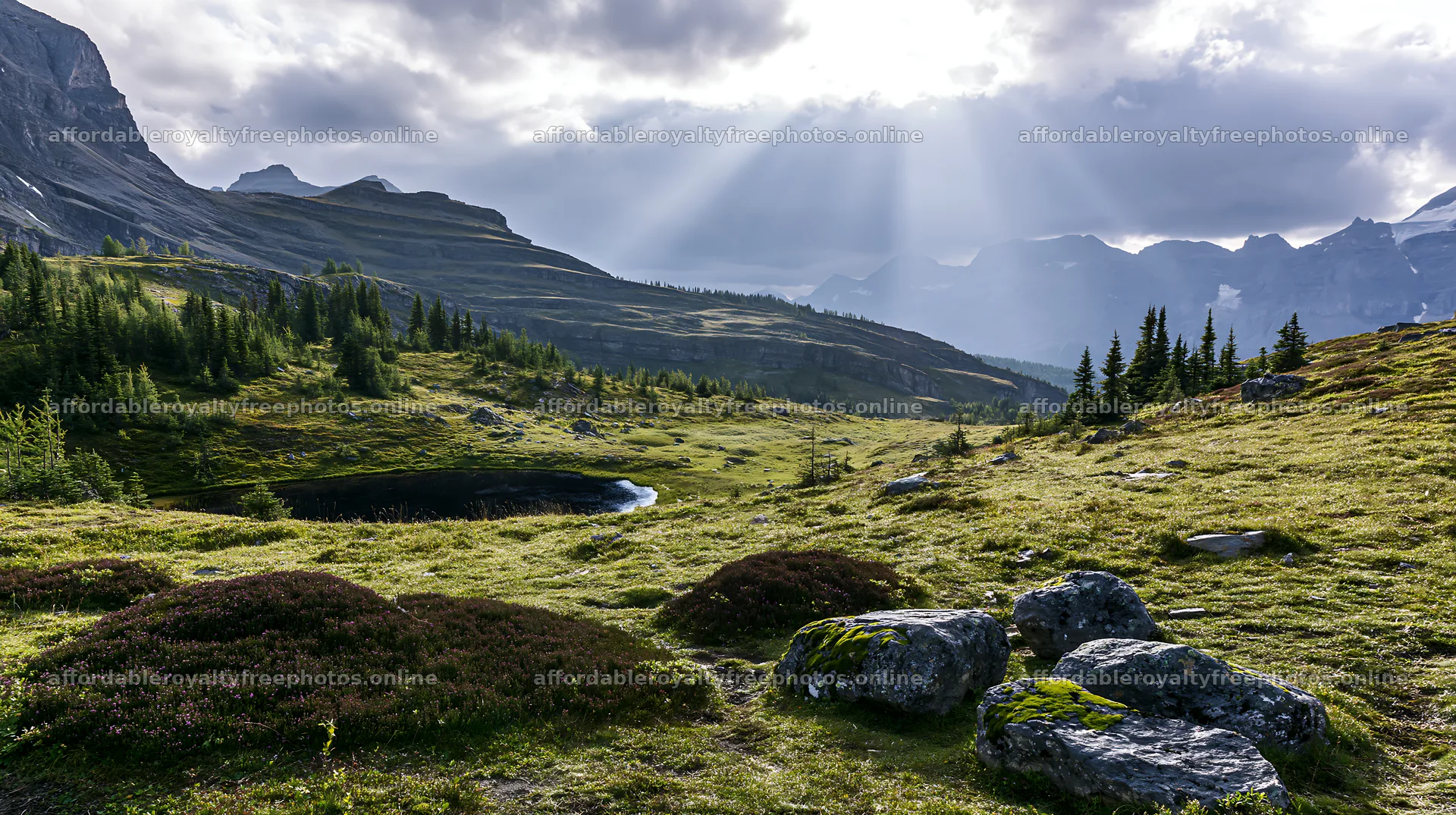 Sunshine rays over meadows and mountains in Banff – royalty-free photos 10608x5938