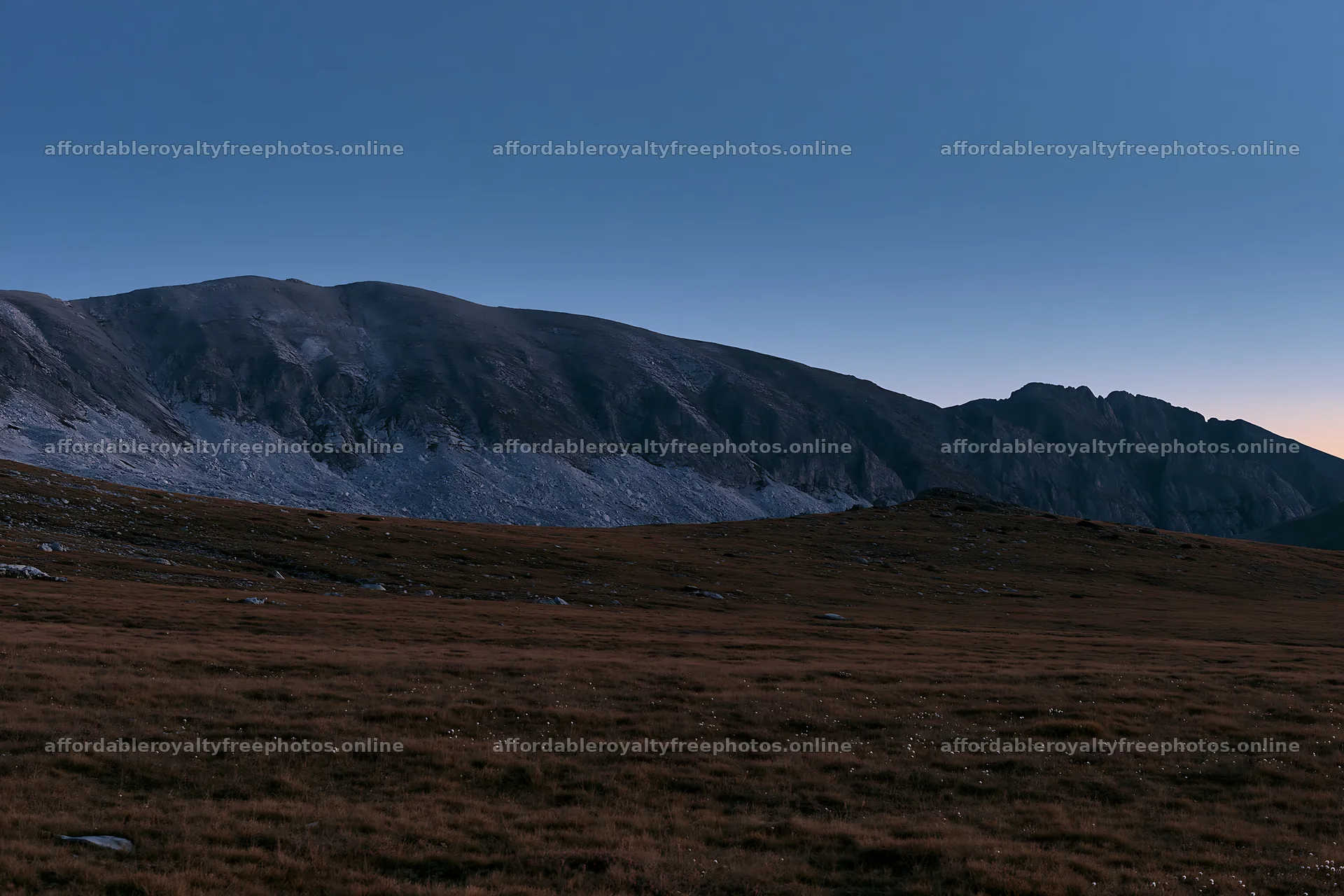 Moonrise over a meadow and mountain landscape – royalty-free photos 9722x6480