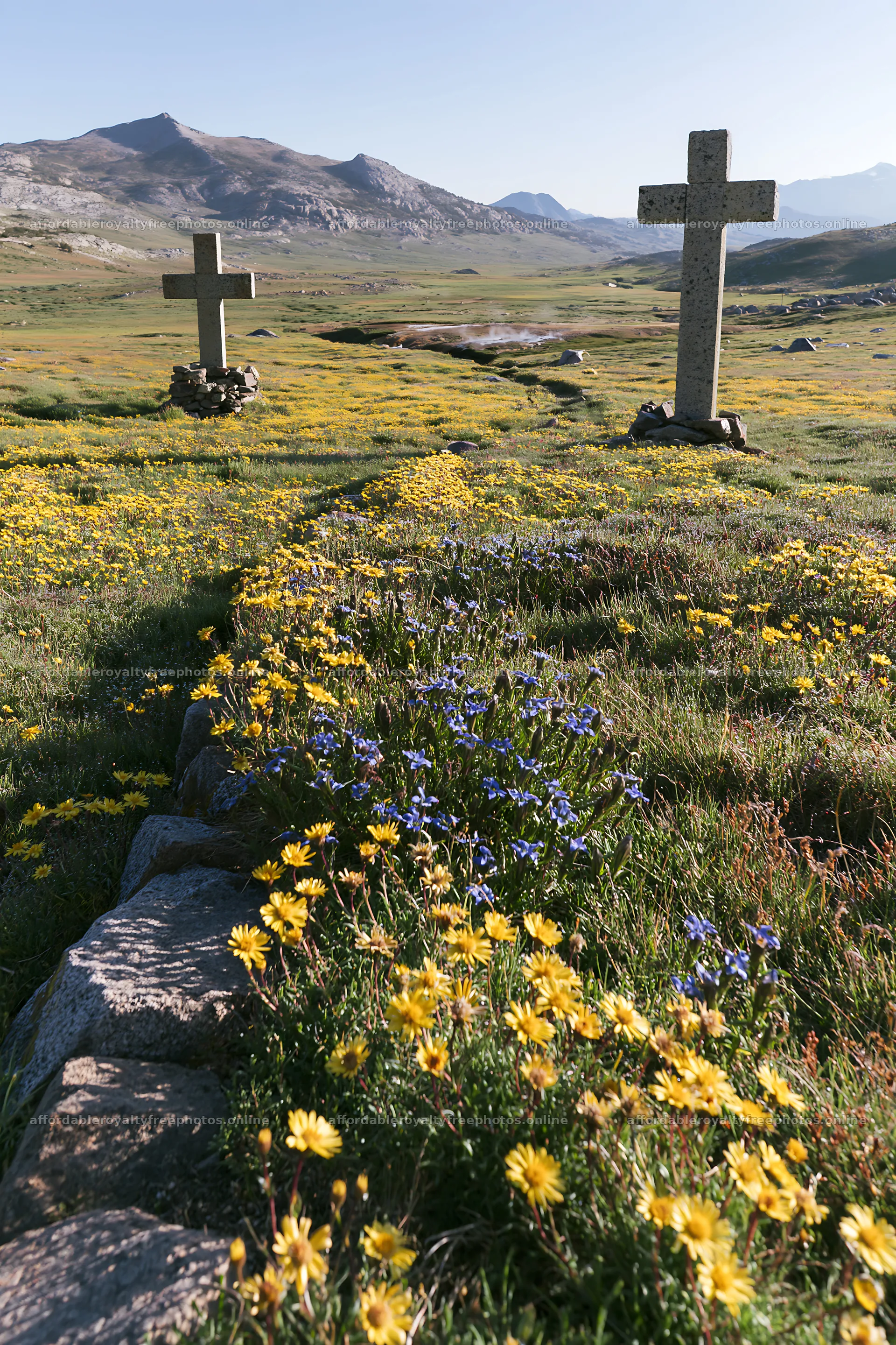 Two Christian crosses near a thermal spring meadow – royalty-free photos 6480x9722