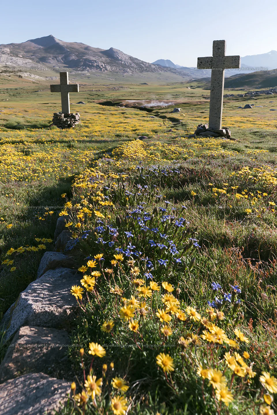 Two Christian crosses near a thermal spring meadow – royalty-free photos 6480x9722