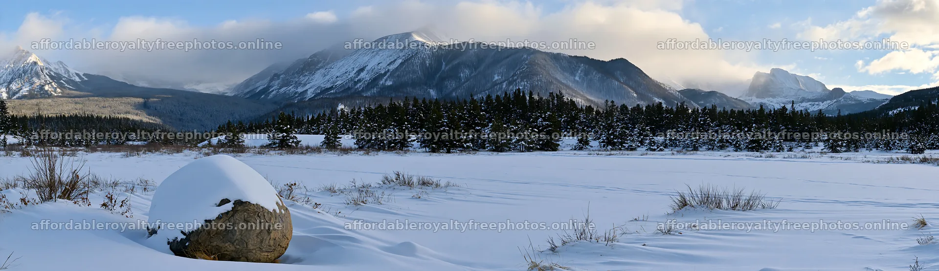 Snowy meadow in Rocky Mountain Park with distant – royalty-free photos 14762x4268