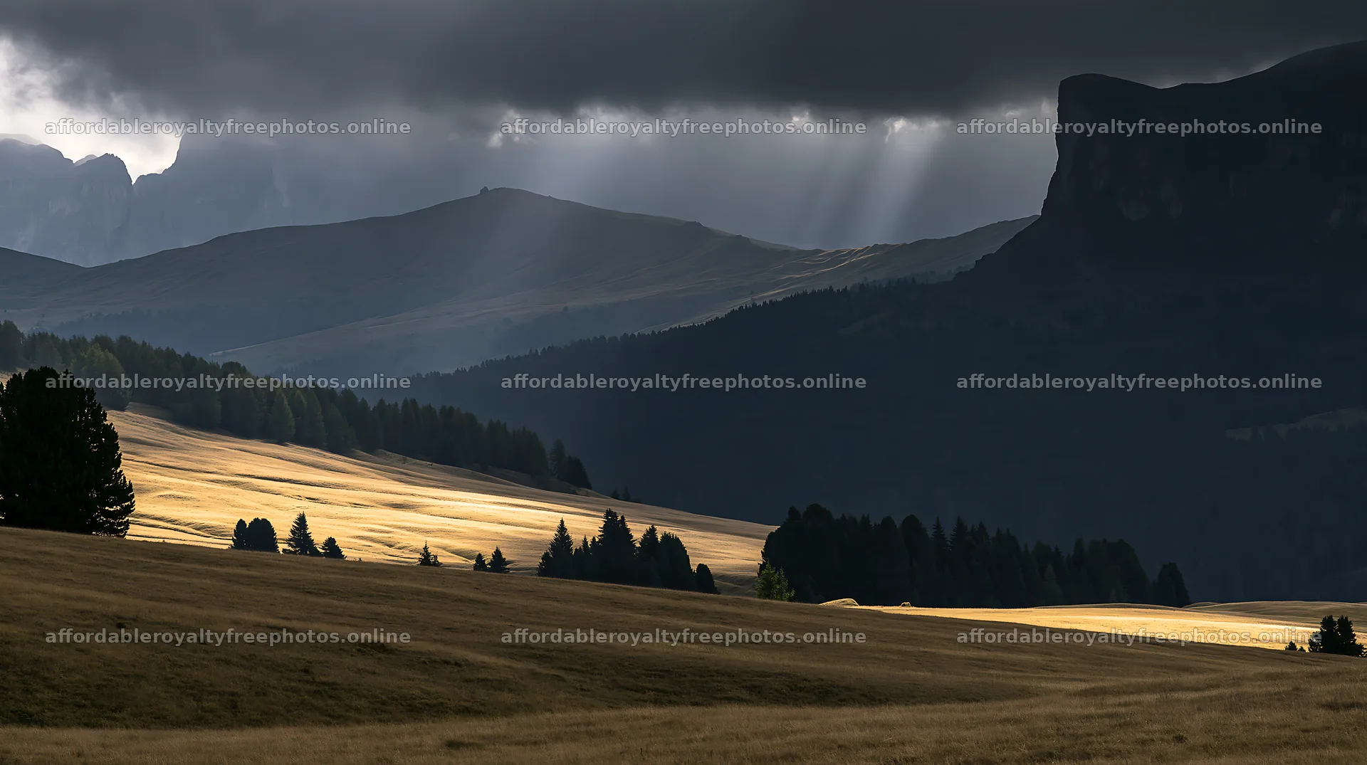 Sunbeams shining on Alpe di Siusi meadow during cloudy – royalty-free photos 10608x5938